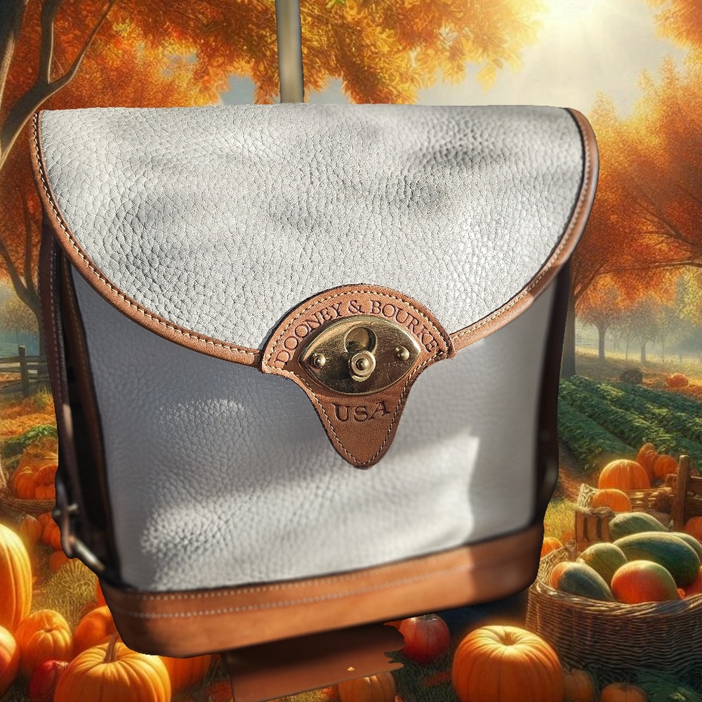 Dooney & Bourke all leather cream cross-body bag
